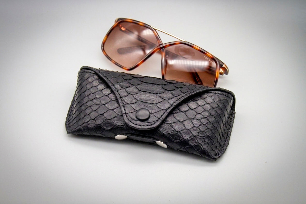 
                  
                    Python Leather Sunglasses Case - Black
                  
                