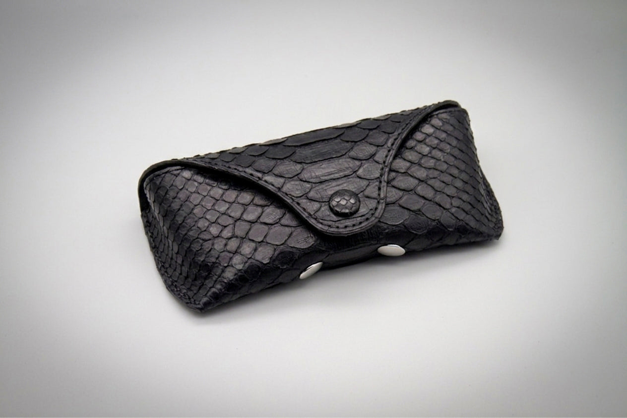 
                  
                    Python Leather Sunglasses Case - Black
                  
                