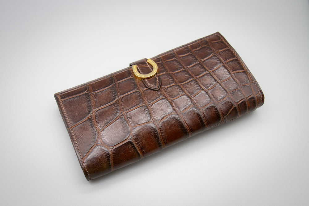 
                  
                    Alligator clutch wallet
                  
                