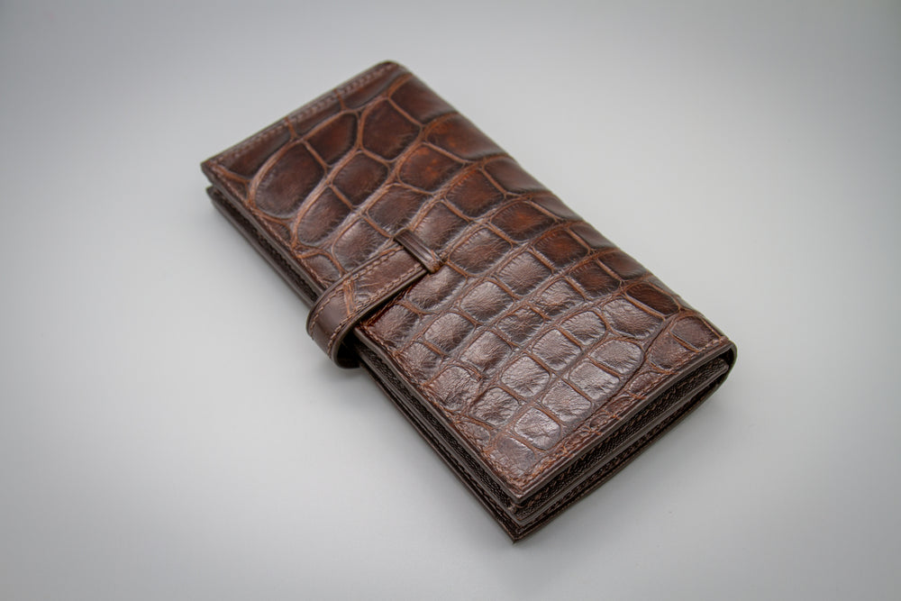 
                  
                    Alligator leather clutch
                  
                