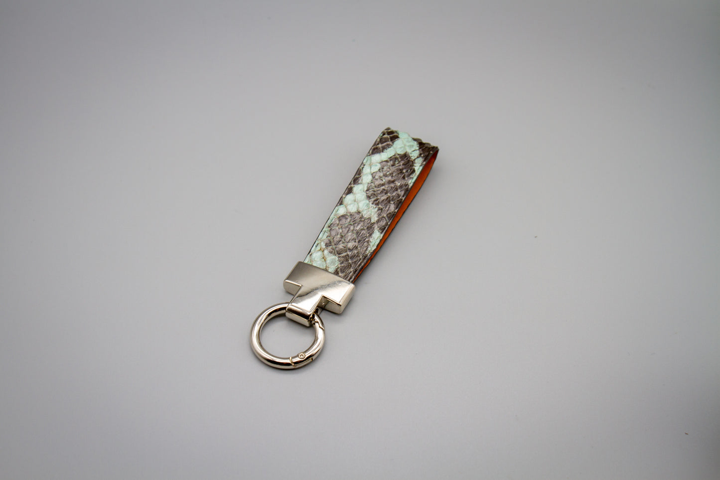 
                  
                    Luxury Leather Keychain - Pale Mint Anaconda
                  
                
