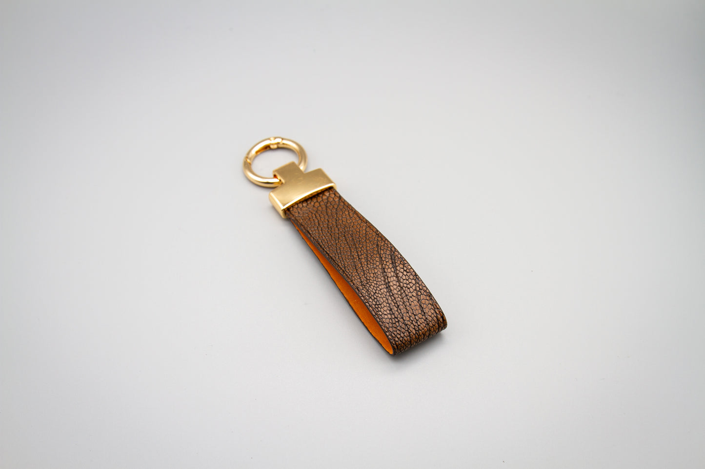 
                  
                    Luxury Leather Keychain - Tobacco Ostrich
                  
                