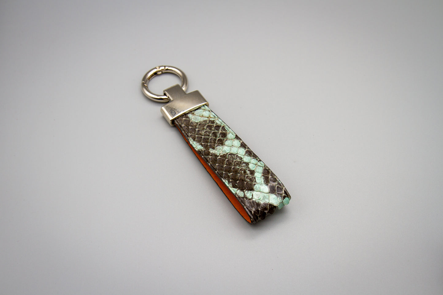
                  
                    Luxury Leather Keychain - Pale Mint Anaconda
                  
                