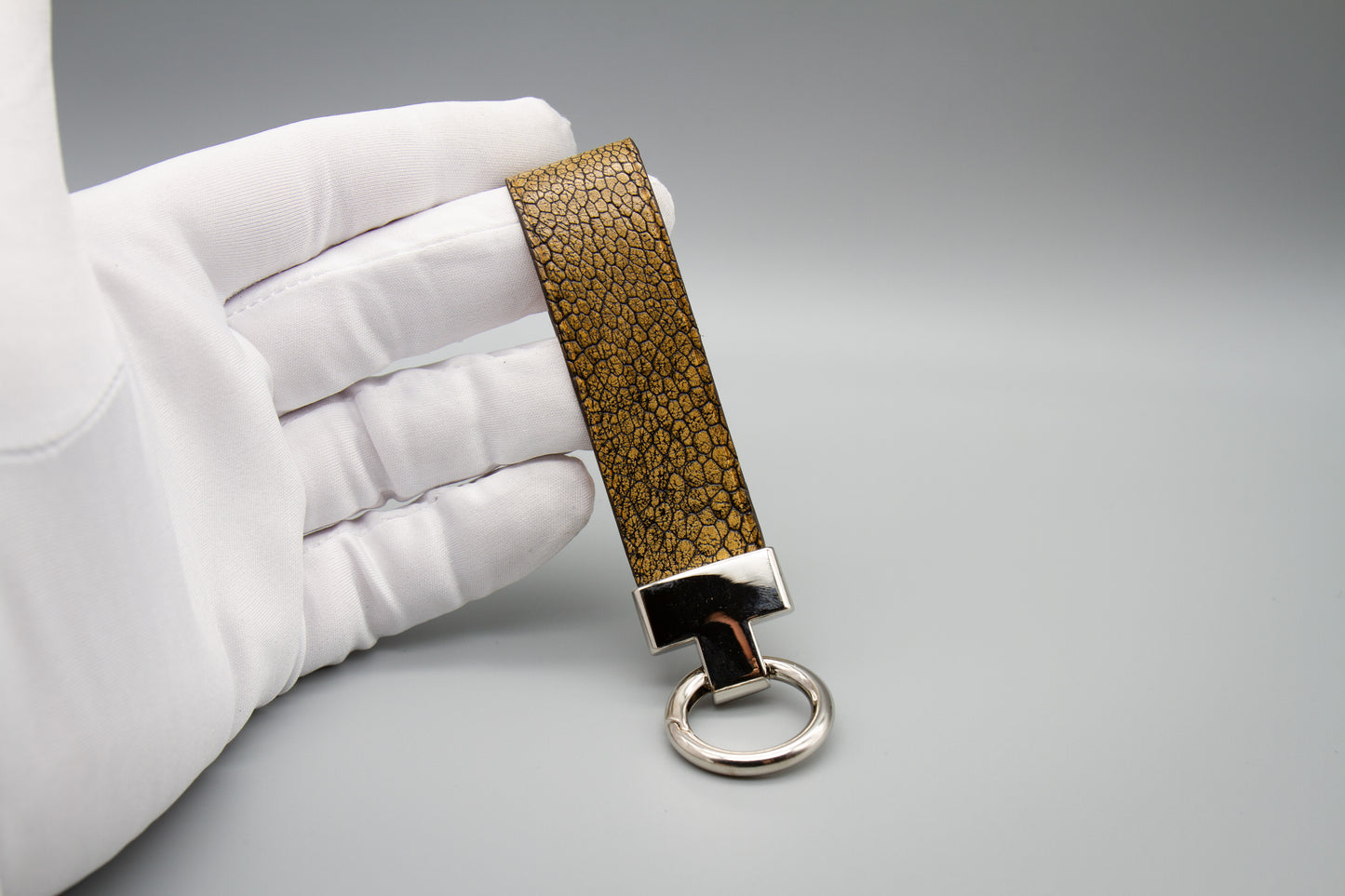 
                  
                    Luxury Leather Keychain - Metallic Brown Ostrich
                  
                