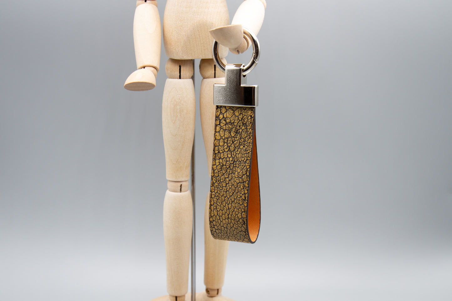 
                  
                    Luxury Leather Keychain - Metallic Brown Ostrich
                  
                