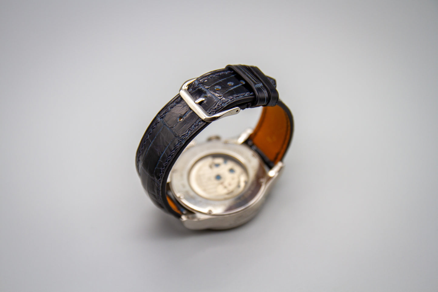 
                  
                    Midnight blue alligator leather watch strap showing scale pattern variation
                  
                