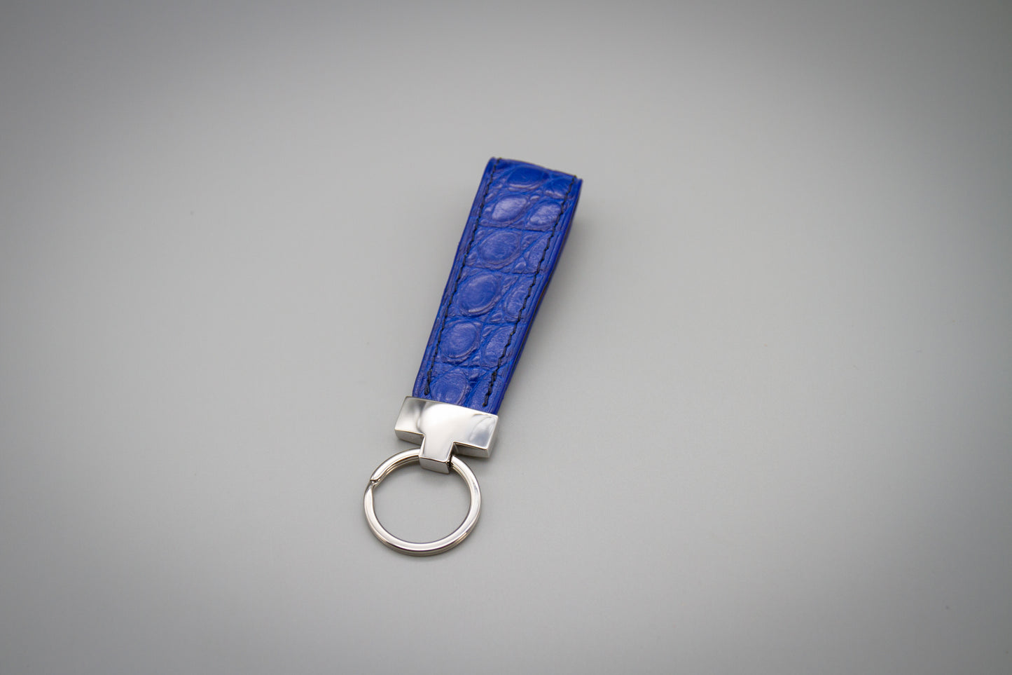 
                  
                    Luxury Crocodile Leather Keychain - Bright Blue
                  
                