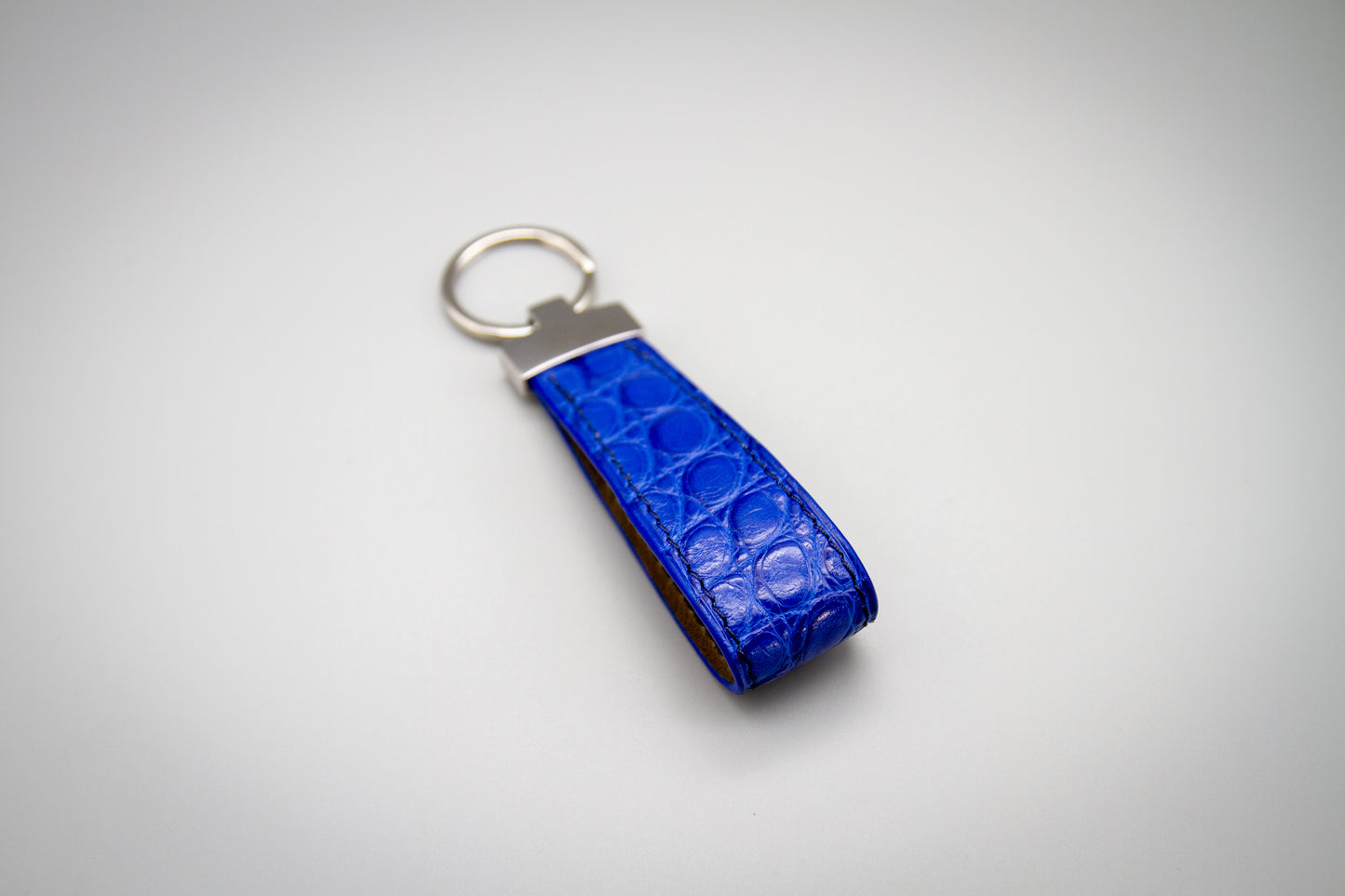 
                  
                    Luxury Crocodile Leather Keychain - Bright Blue
                  
                