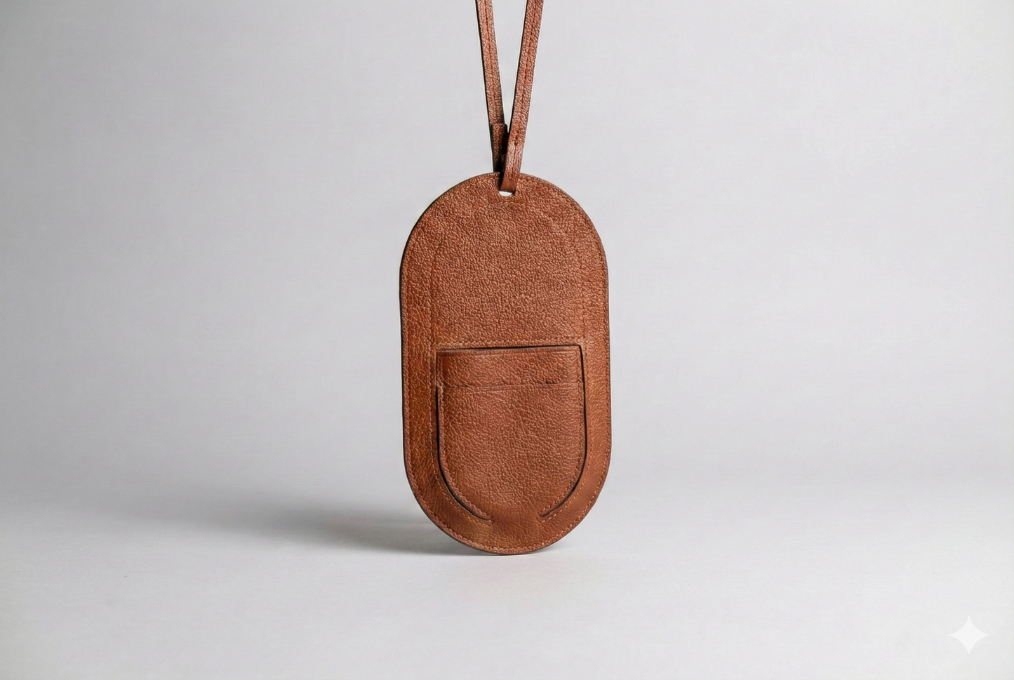 
                  
                    Leather Phone Purse in Brown French Chèvre
                  
                